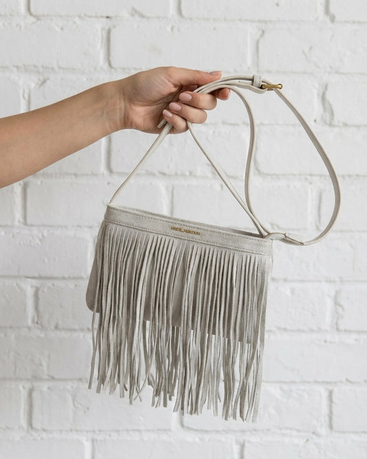 FAUX SUEDE TASSLE BAG - BEIGE